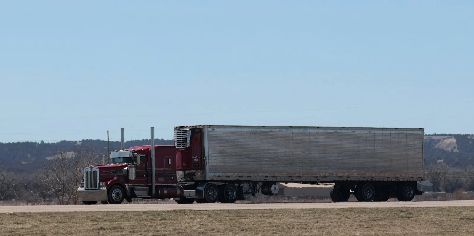 A semi truck with a long trailer on Interstate 80 in Nebraska